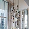 Modern Industrial Multi-Light Pendant Chandelier - 9-Light Black and Gold Adjustable Ceiling Light Fixture with Mesh Cylinder Shades for Living Room,